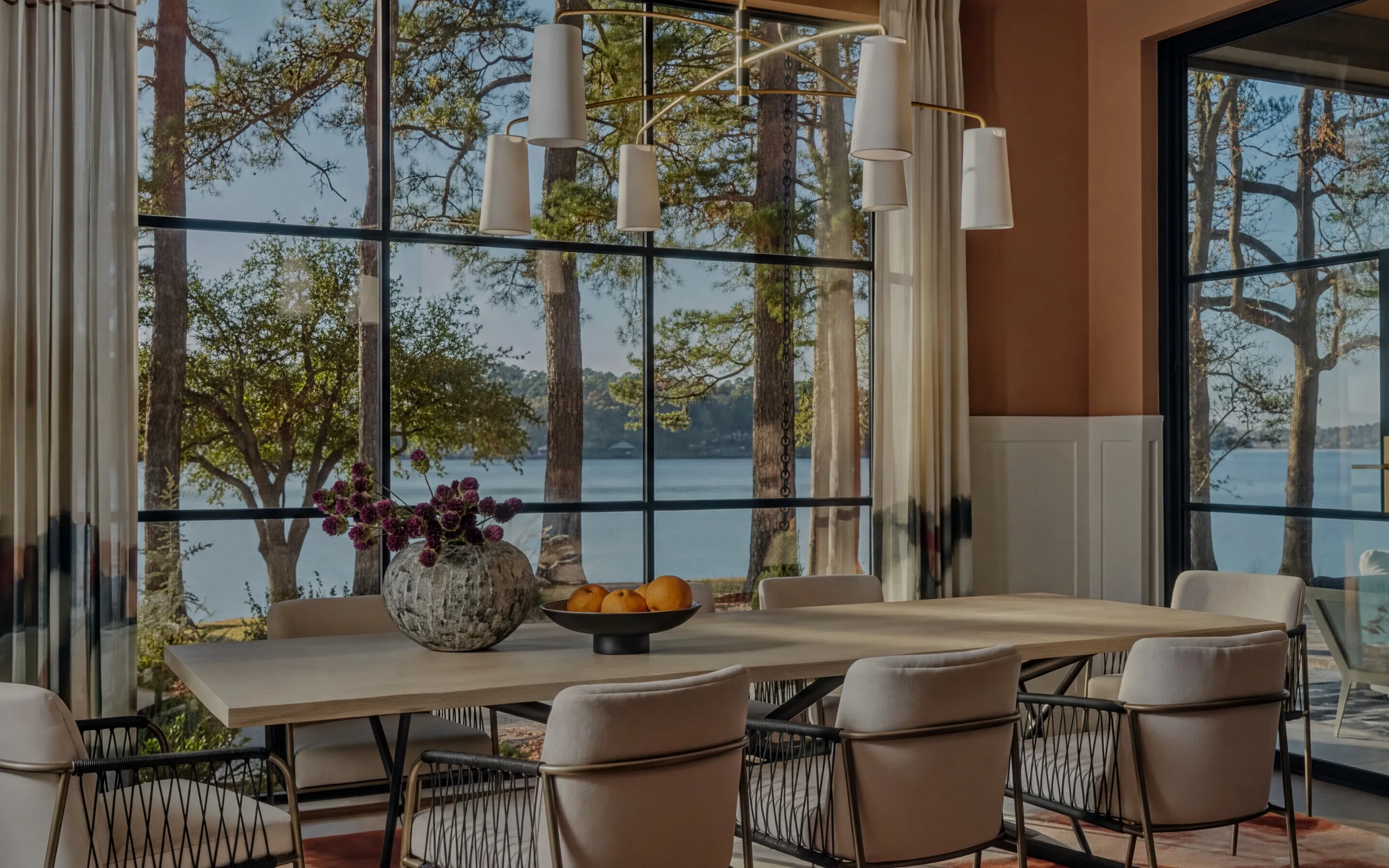 a dining room with a table for eight people